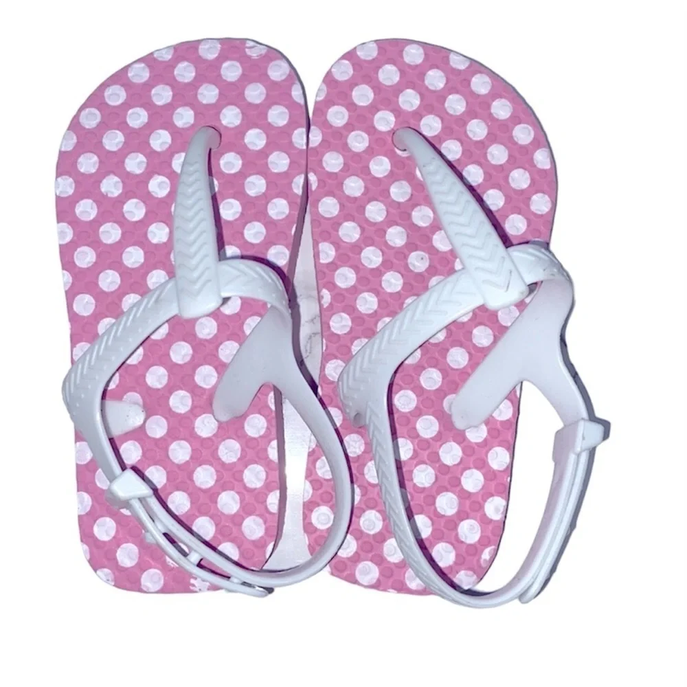 Girls pink polka dot flip flops size 7